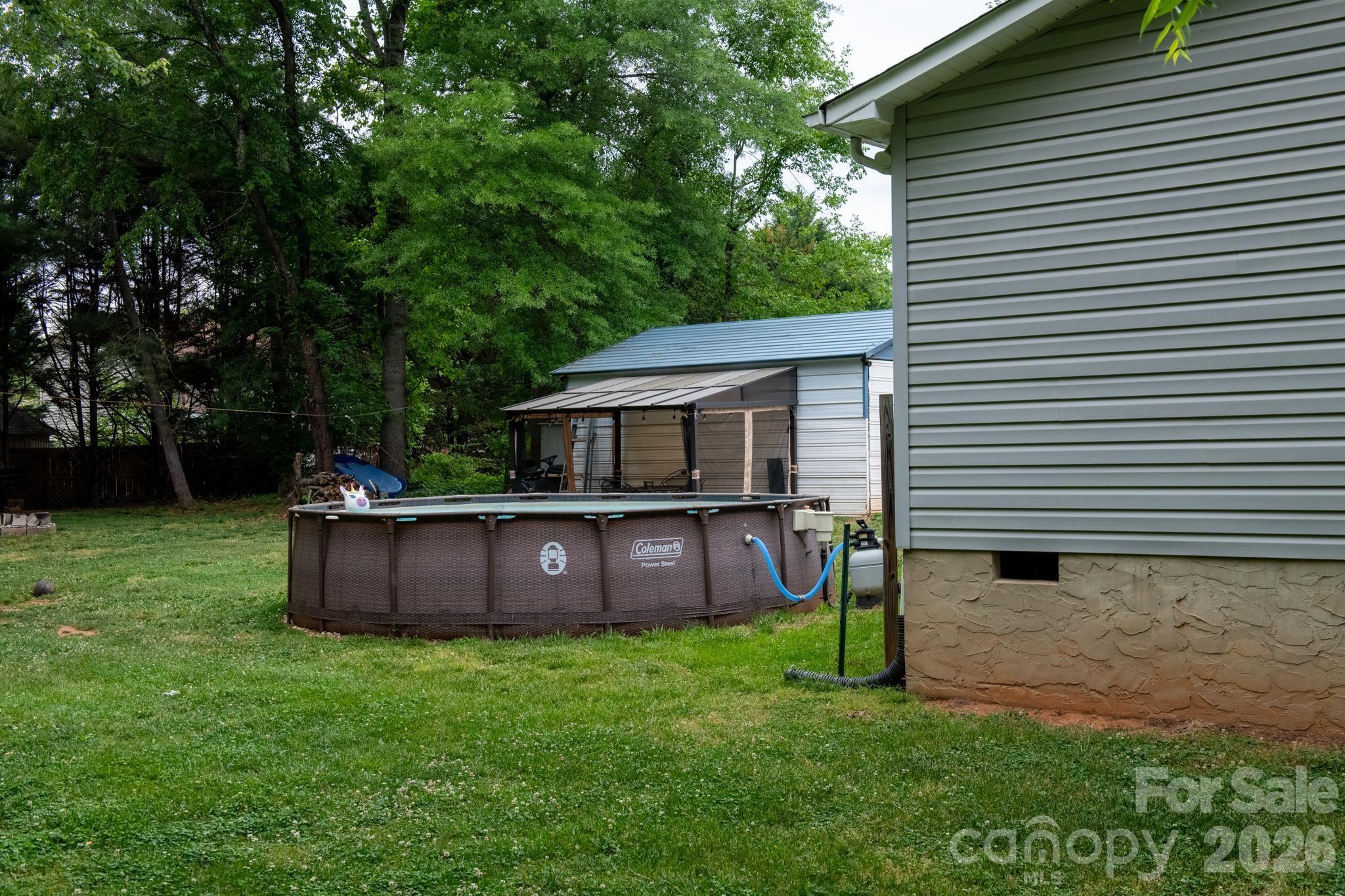 2308 Walt Arney Road Lenoir, NC 28645 - Photo 6 of 37 a front view of house with a garden