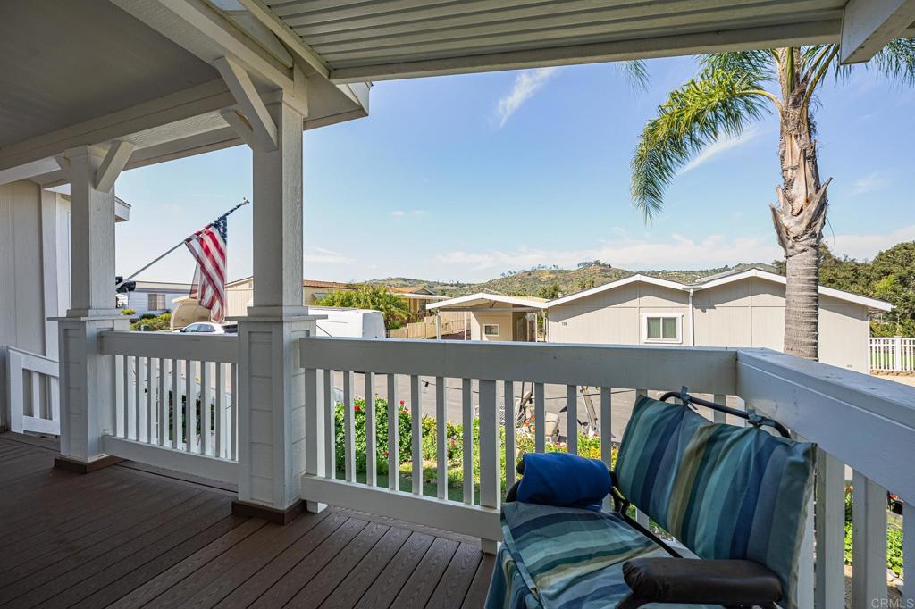 4650 Dulin Road, Unit 137 Fallbrook, CA 92003 - Photo 23 of 54 a view of a balcony with furniture