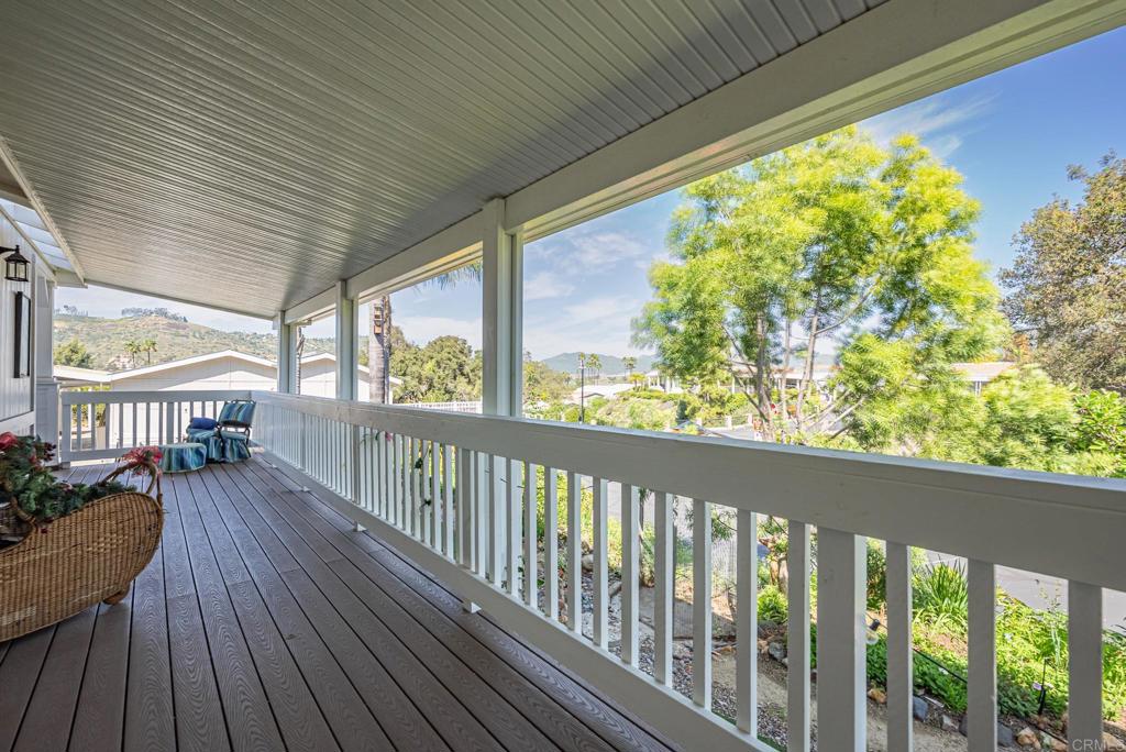 4650 Dulin Road, Unit 137 Fallbrook, CA 92003 - Photo 26 of 54 a view of a porch with wooden floor