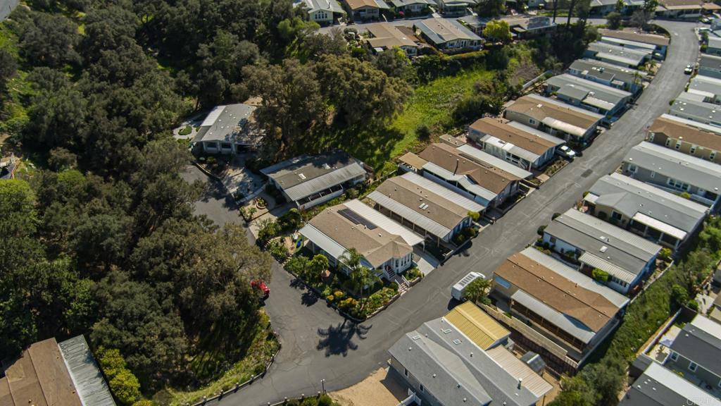4650 Dulin Road, Unit 137 Fallbrook, CA 92003 - Photo 36 of 54 an aerial view of a house with a garden