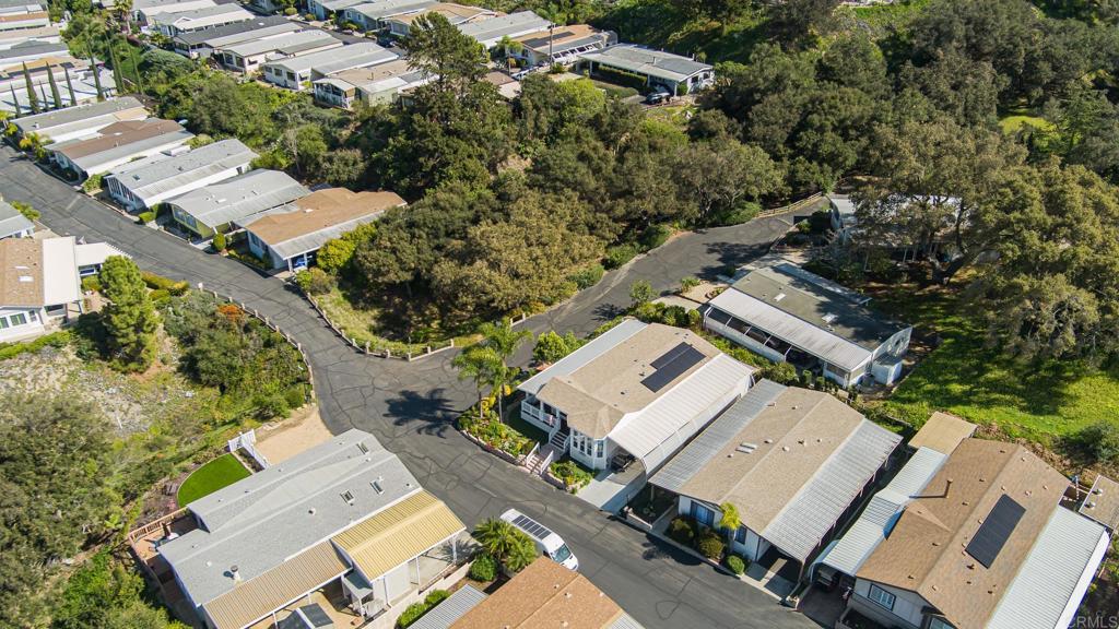4650 Dulin Road, Unit 137 Fallbrook, CA 92003 - Photo 37 of 54 an aerial view of a city with lots of residential buildings