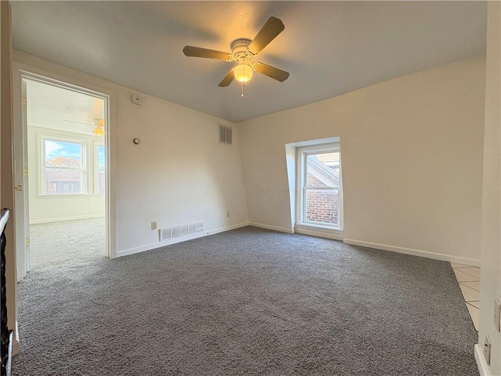 467 Oneida Street, Unit 2 Pittsburgh, PA 15211 - Photo 2 of 6 a view of an empty room with a window