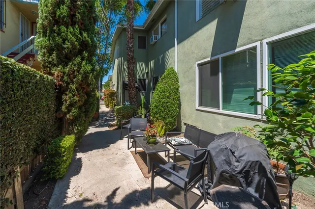 a view of balcony with wooden floor