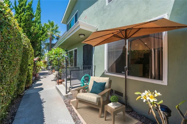 a building outdoor space with patio furniture