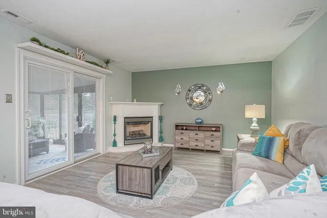 a kitchen with stainless steel appliances granite countertop a stove microwave and sink