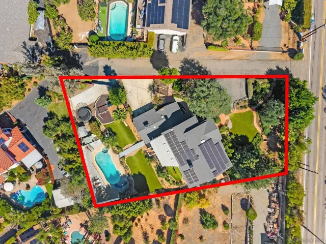 a view of room with window and wooden floor