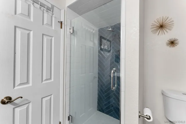 an aerial view of residential house with an outdoor space and seating