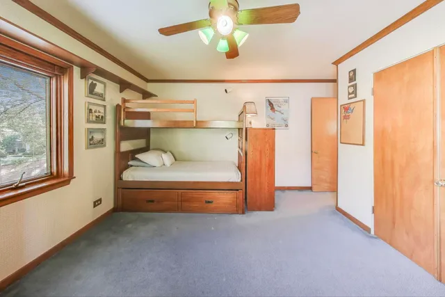 a view of an empty room and a window