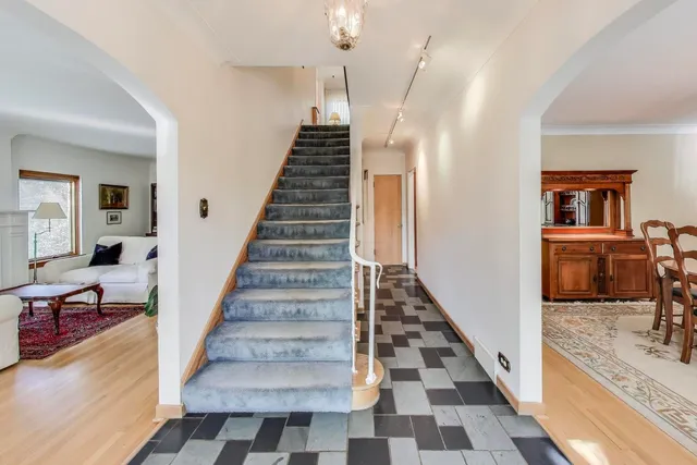 a view of a living room and entry way