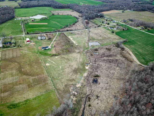 a backyard of a house with lots of green space