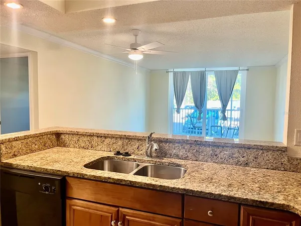 a view of a sink and a mirror