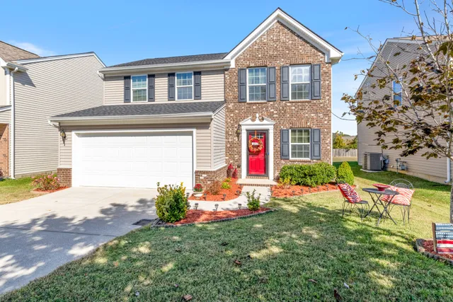 a front view of house with yard