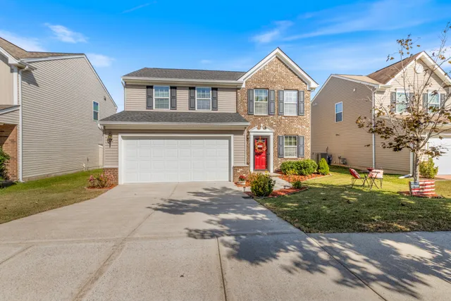 a front view of house with yard