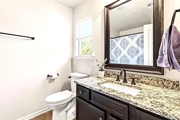 a view of a bathroom with shower