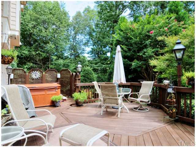 5528 Overleaf Court Raleigh, NC 27615 - Photo 21 of 25 a view of backyard with seating space and trees