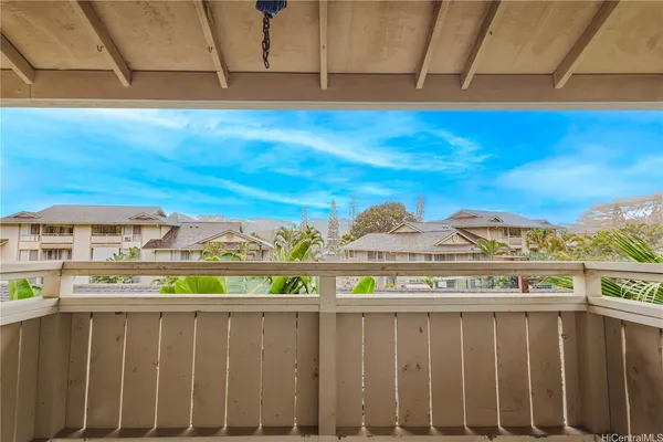 a view of a balcony with an outdoor space