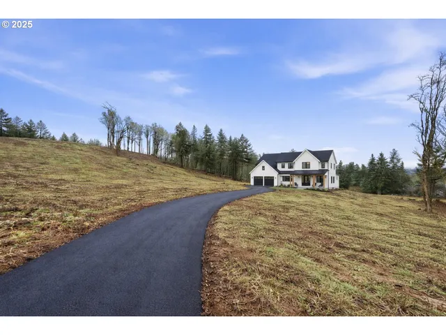a view of a lake with a big yard