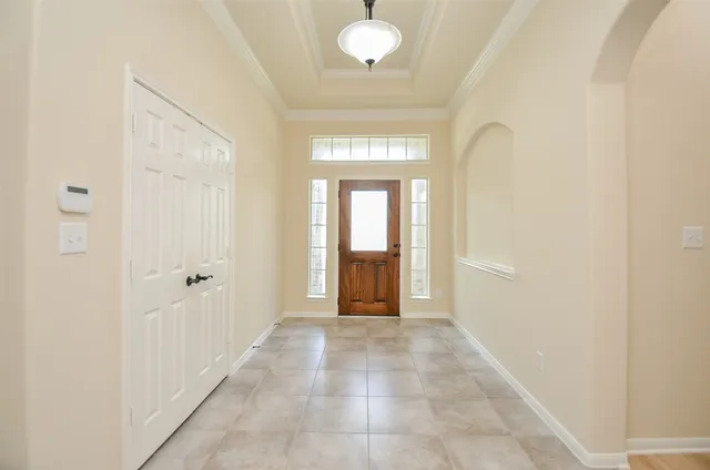 a view of entryway with a front door