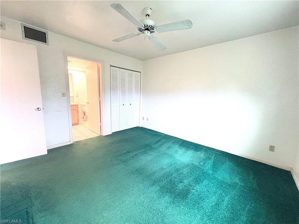 1004 Manatee Road, Unit H104 Naples, FL 34114 - Photo 8 of 13 Owner Bedroom