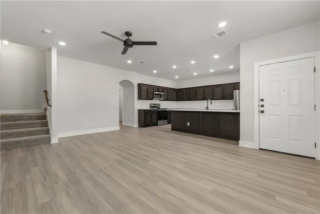 a view of kitchen and wooden floor