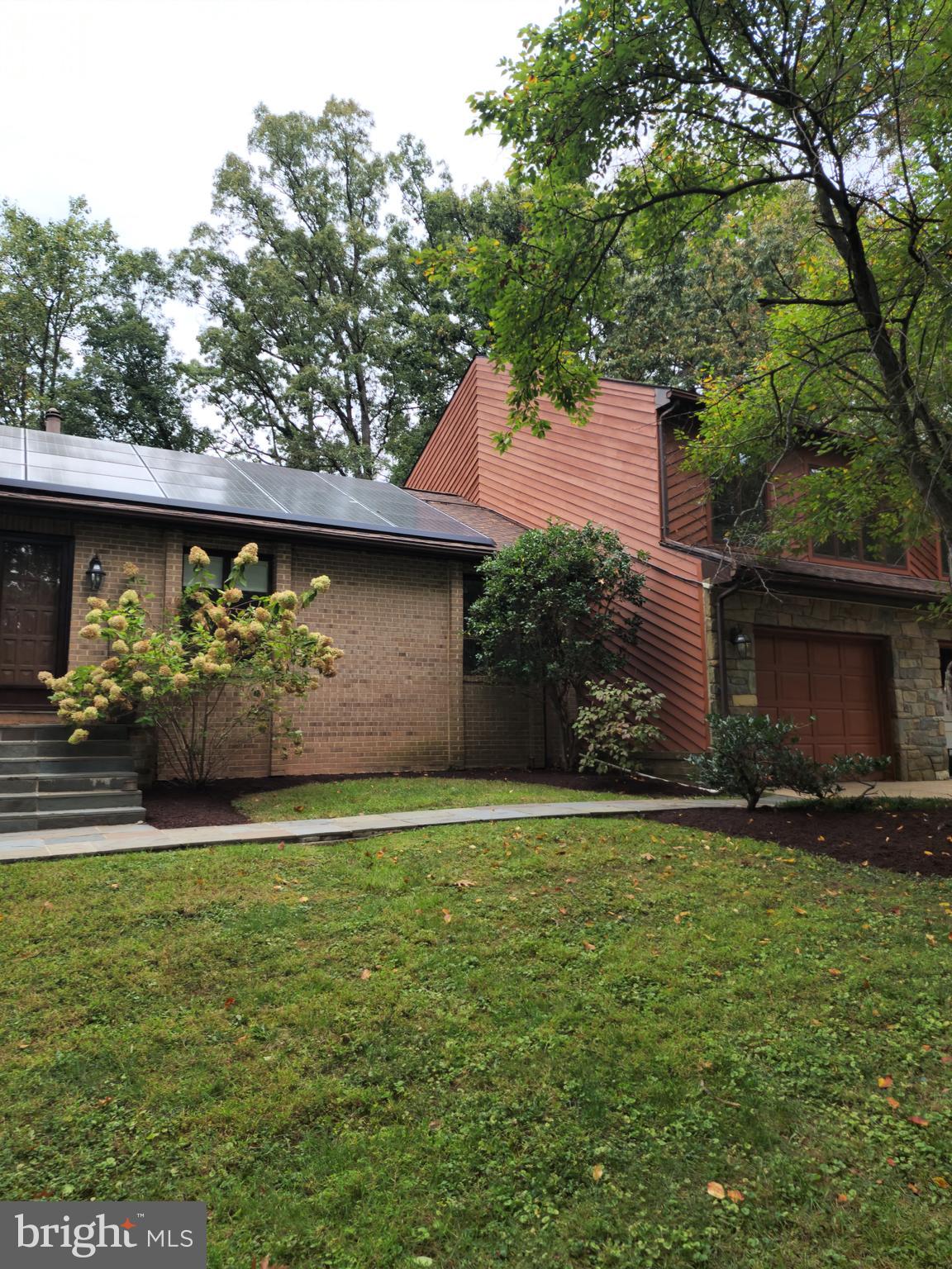 416 Marshall Manor Drive Silver Spring, MD 20905 - Photo 1 of 11 a view of a backyard of the house