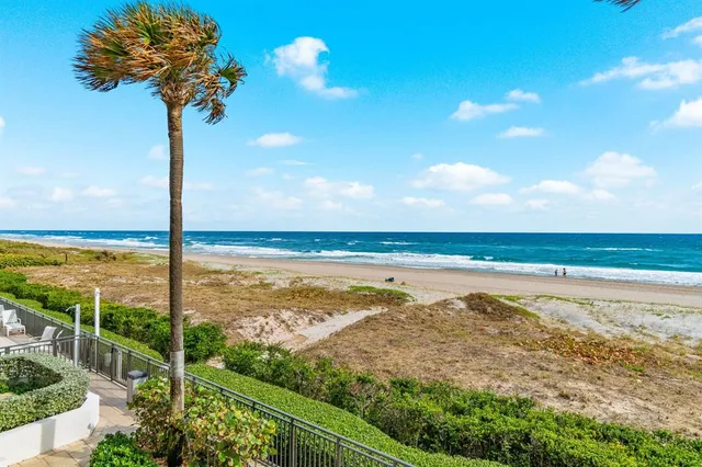 a view of a lake with a big yard
