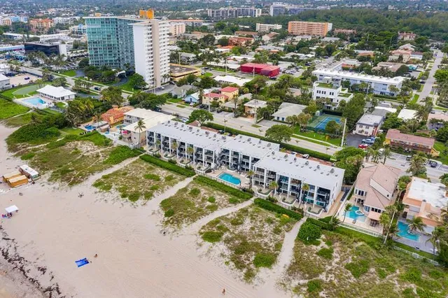 a view of a lake with a big yard