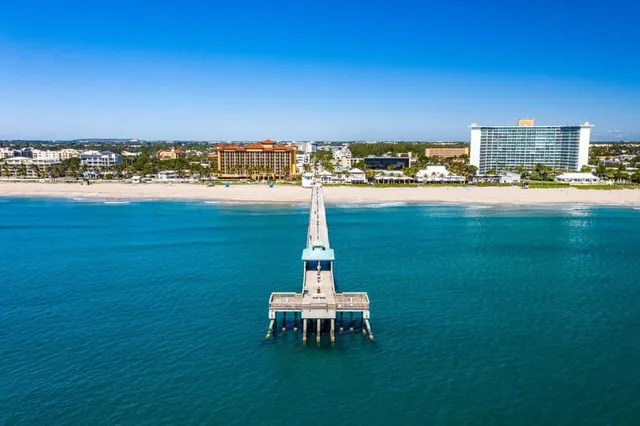 an aerial view of beach and ocean