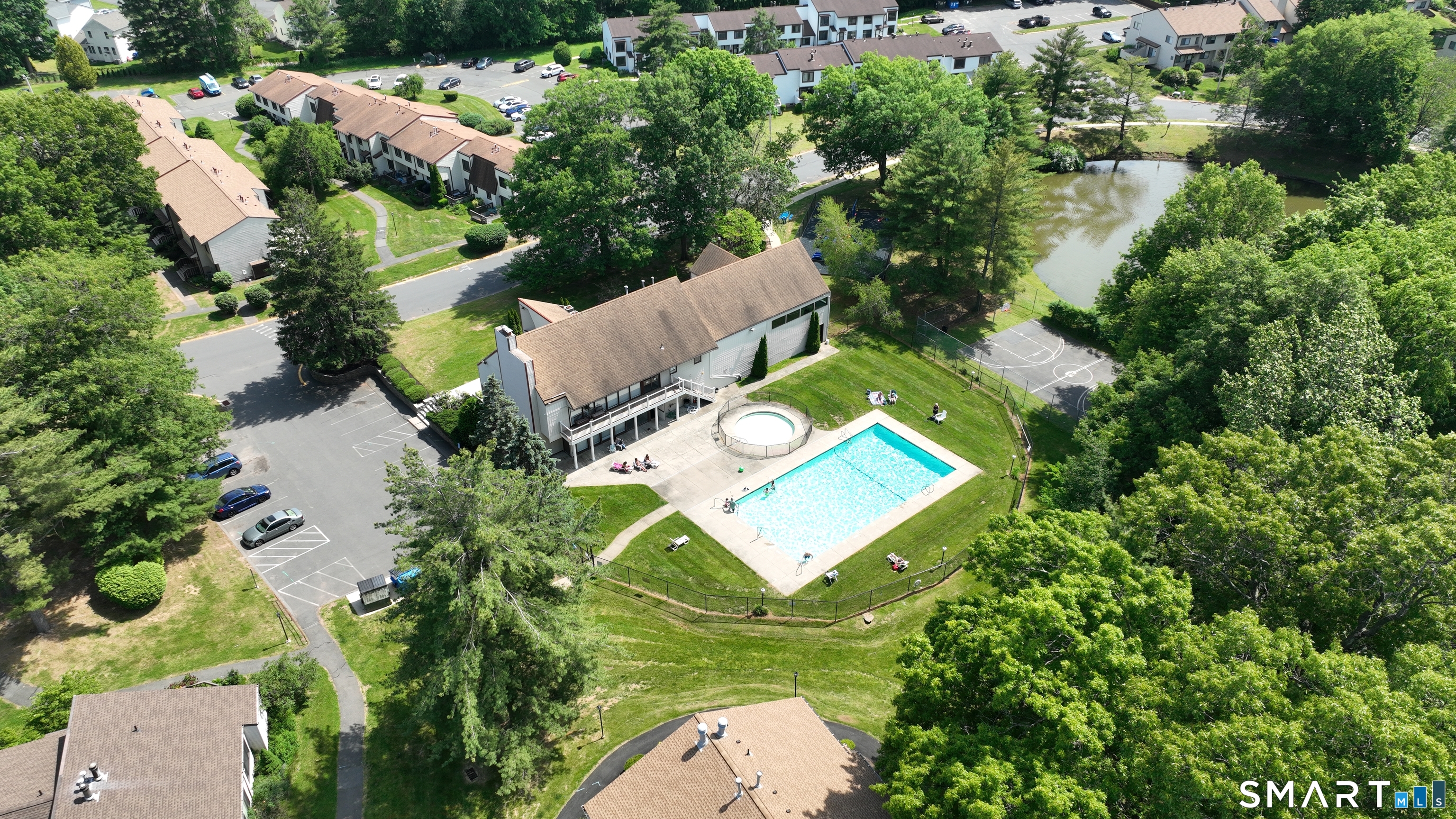 94 Cottonwood Road, Unit 94 Newington, CT 06111 - Photo 31 of 33 Community club house, pool, hot tub, tennis court, pond, playground for kids.