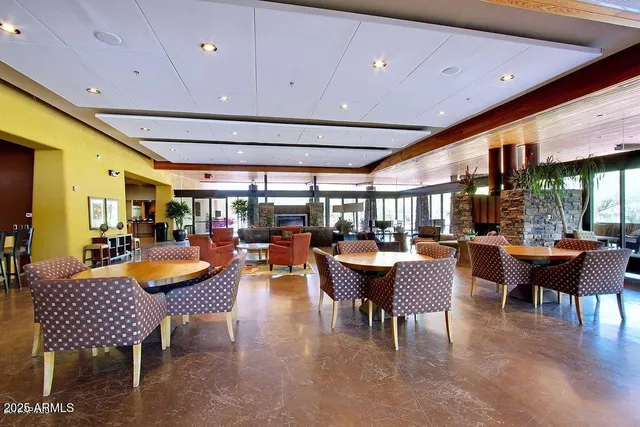 a outdoor space with lots of furniture and outdoor seating