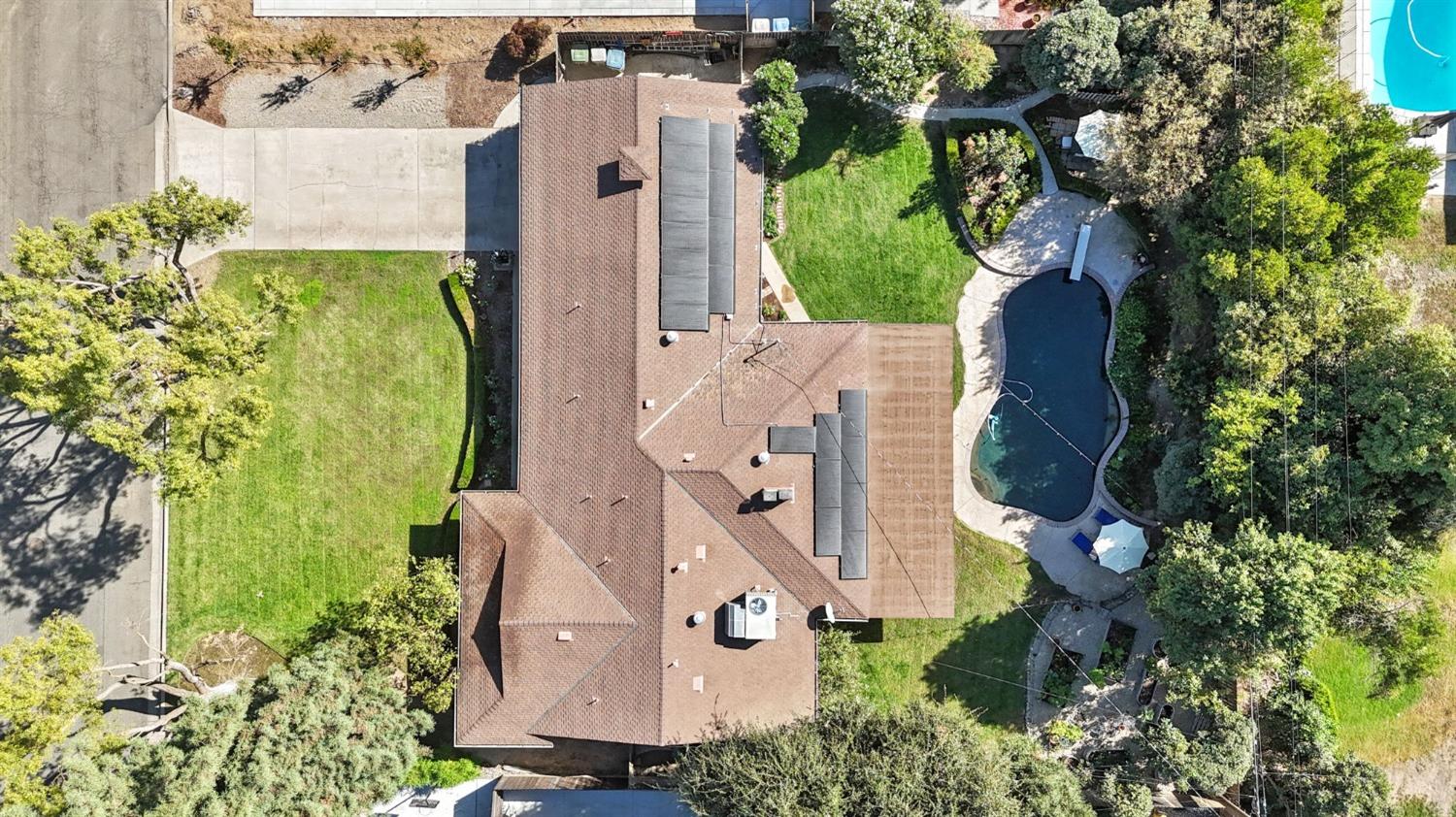 1323 West San Ramon Avenue Fresno, CA 93711 - Photo 28 of 30 an aerial view of a house with a garden