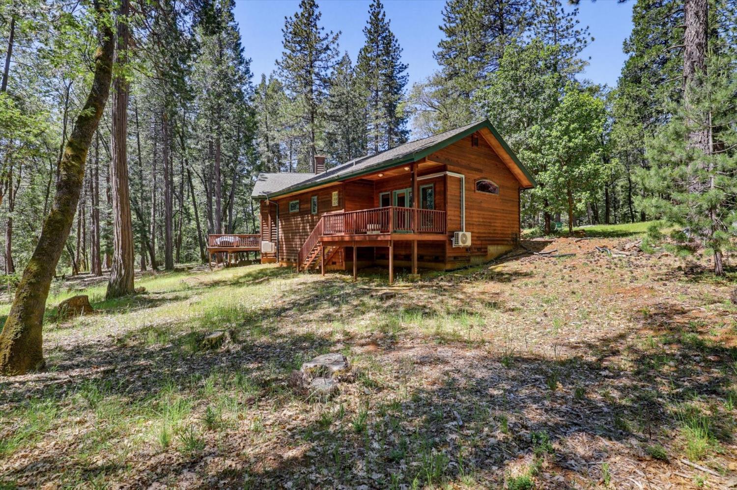 14517 North Bloomfield Road Nevada City, CA 95959 - Photo 49 of 78 a view of a house with a yard