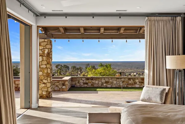 a kitchen with cabinets washer and dryer