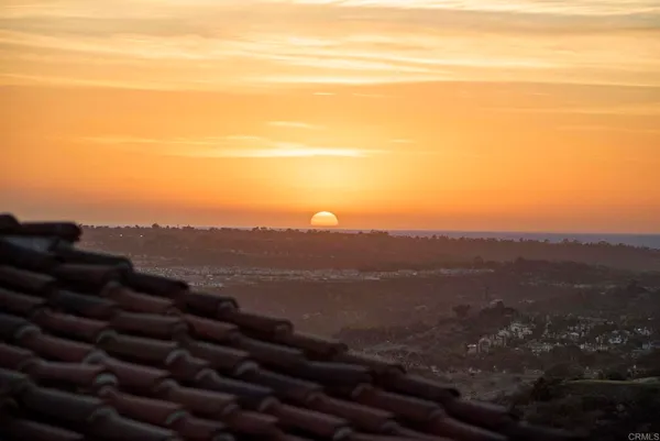 a large bathroom with a double vanity sink a mirror and a shower