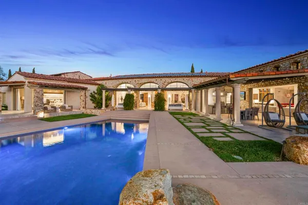 front view of a house with a patio