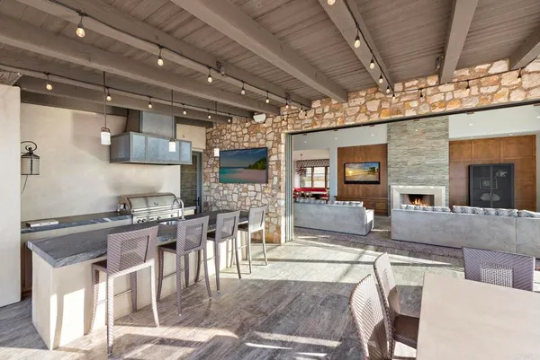 a view of swimming pool with lounge chair