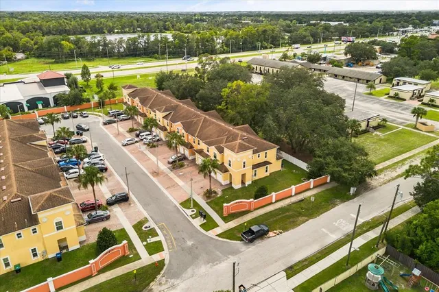 an aerial view of residential building and lake view