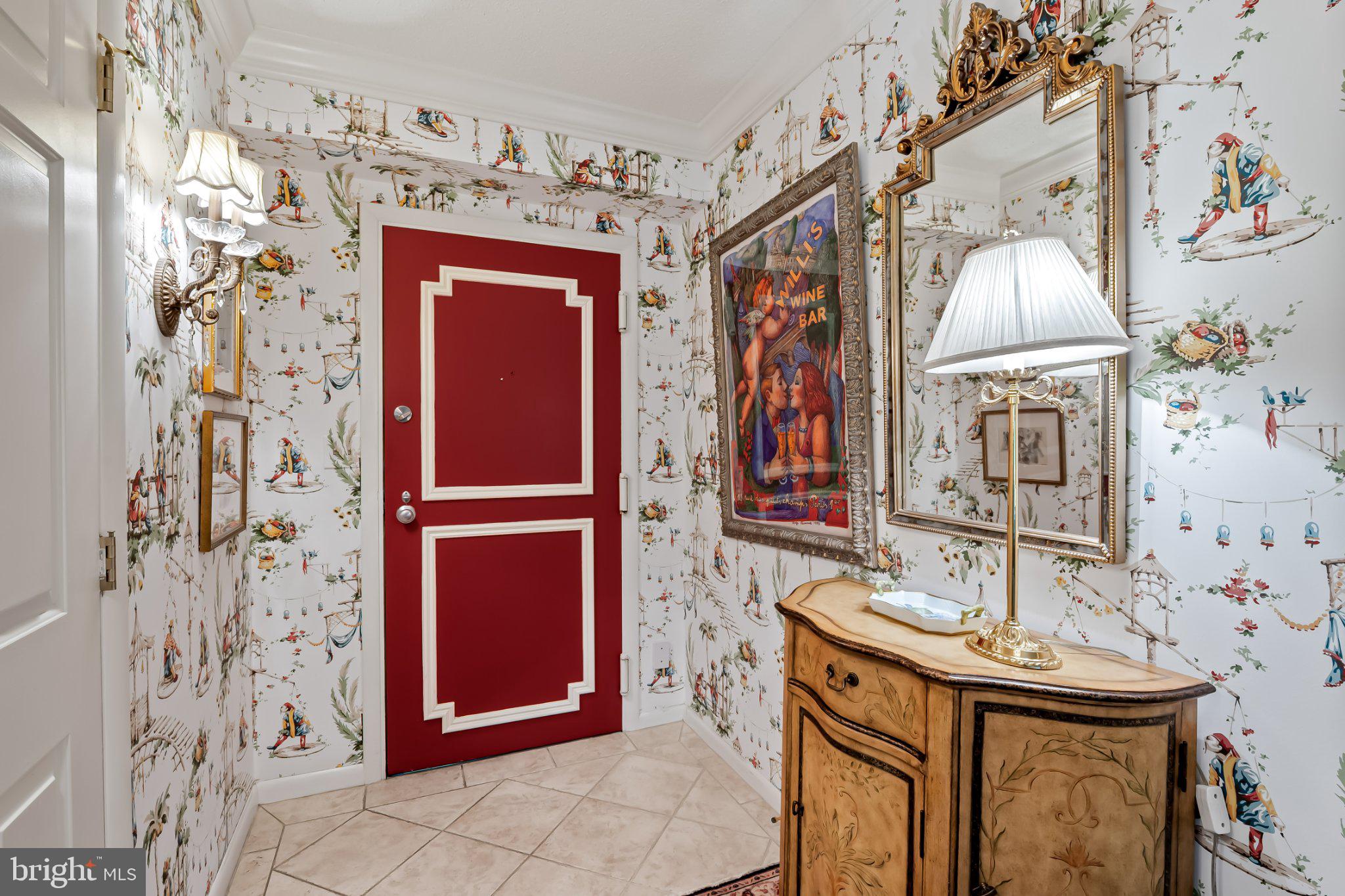 111 Hamlet Hill Road, Unit 205 Baltimore, MD 21210 - Photo 7 of 65 Charming entryway with vibrant decor.