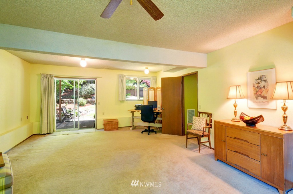 16631 24th Drive Southeast Bothell, WA 98012 - Photo 14 of 24 a bedroom with furniture and a window