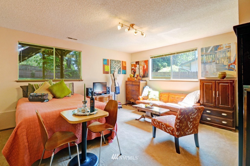 16631 24th Drive Southeast Bothell, WA 98012 - Photo 18 of 24 a dining room with furniture and a large window