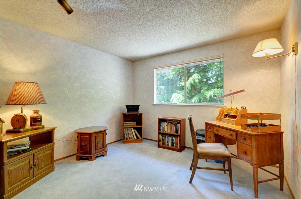 16631 24th Drive Southeast Bothell, WA 98012 - Photo 19 of 24 a room with furniture and a window