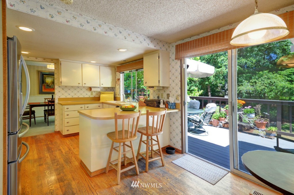 16631 24th Drive Southeast Bothell, WA 98012 - Photo 8 of 24 a very nice looking dining room with a large window and dining table