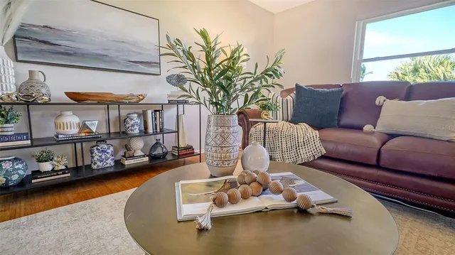 a living room with furniture and a window