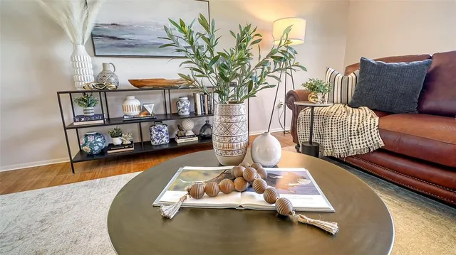 a vase of flowers sitting on a table