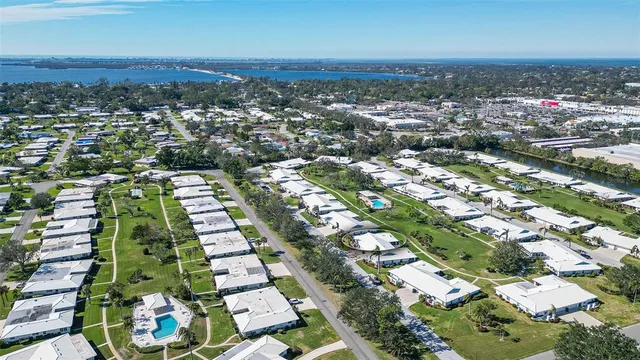 a view of a balcony with wooden floor