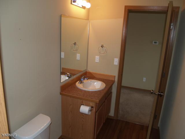 350 Keystone Road Yakima, WA 98908 - Photo 12 of 28 a bathroom with a toilet sink and mirror