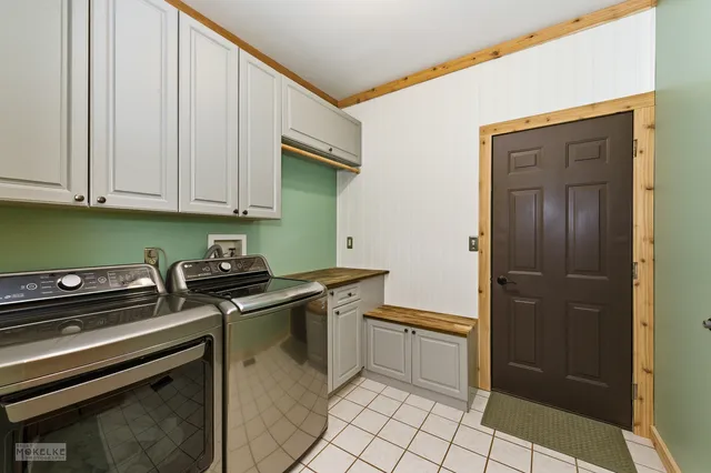 a kitchen with a stove cabinets and counter space