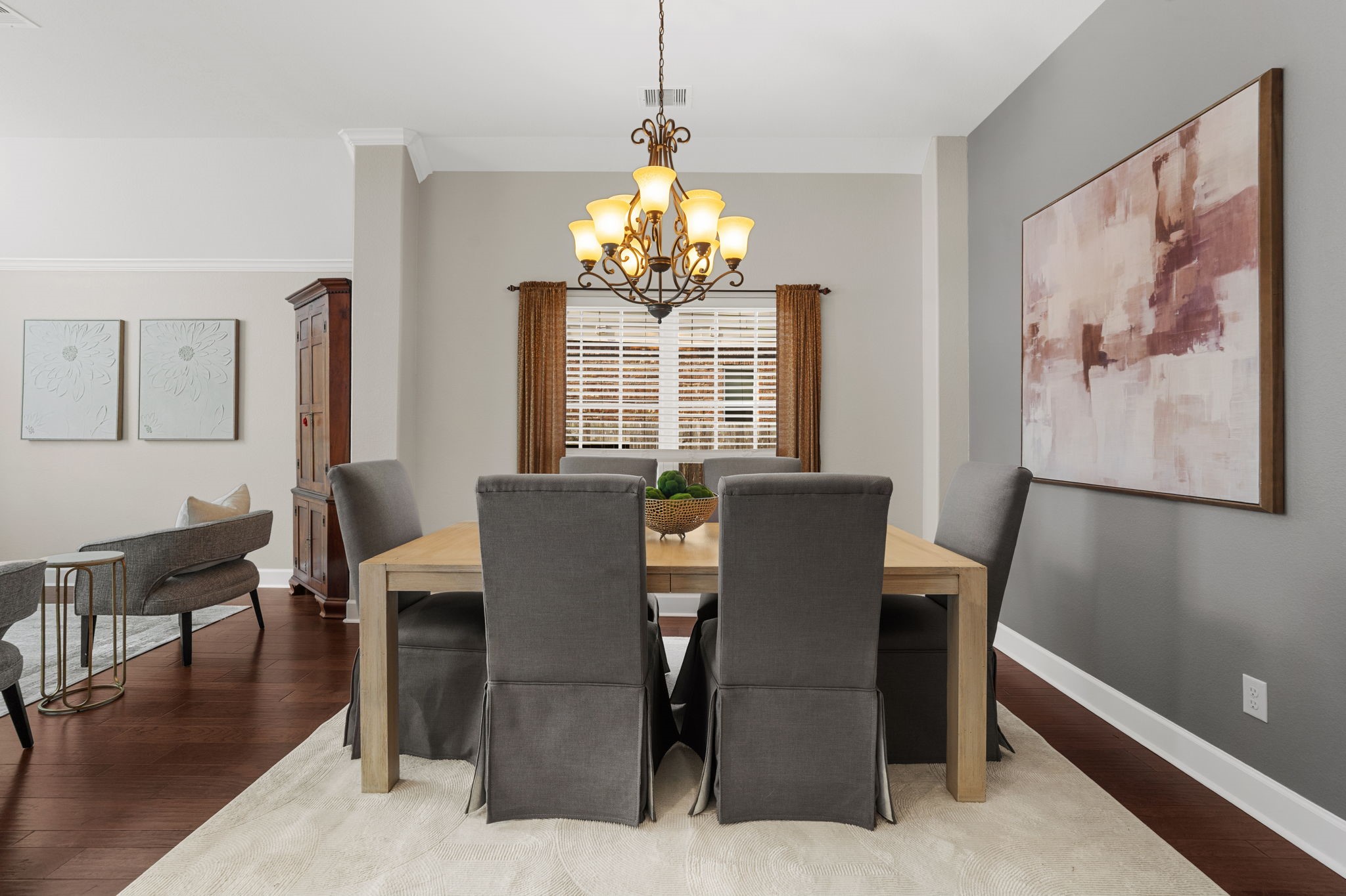 3426 Summer Ranch Drive Katy, TX 77494 - Photo 6 of 48 The formal dining room is designed for memorable gatherings, complete with a statement chandelier, rich flooring, and ample space for hosting everything from holidays to dinner parties.