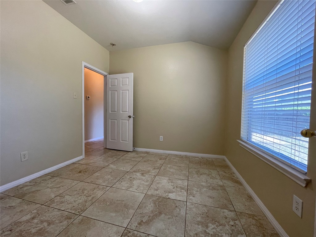 Undisclosed Address Austin, TX 78729 - Photo 5 of 8 a view of an empty room and window