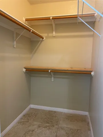 a bathroom with a bathtub a toilet and a shower